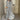 Women's green geometric long sleeve midi dress, featuring a fitted waist, crew neckline, and elegant design suited for fall fashion.