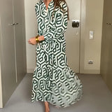 Green geometric long sleeve midi dress for women, featuring a stylish collar and fitted waist, perfect for fall fashion and day wear.
