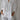 A white women's relaxed fit button-down blouse made from linen, featuring long sleeves, a classic collar, and a comfortable, loose design suitable for casual or professional wear in a 5XL size.