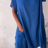 A blue oversized linen tunic dress with short sleeves, designed for casual summer wear in size 3XL (US 20).