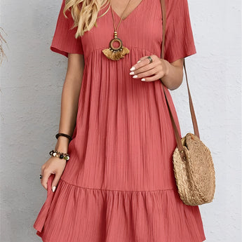 A red pleated midi dress in size 3XL with short sleeves, featuring a fitted waist and a round neckline. The dress is designed for summer casual wear and is shown on a standing model.
