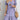 
A short-sleeve pleated midi dress in a vibrant viola color, designed for summer casual wear, displayed in a size 3XL. The dress features a flowing one-piece garment style with a defined neck and shoulder line.