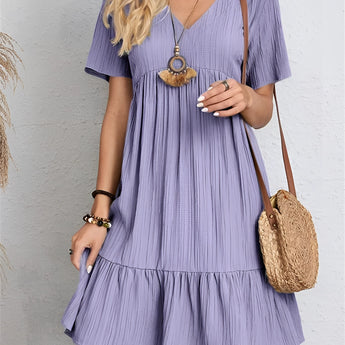 
A short-sleeve pleated midi dress in a vibrant viola color, designed for summer casual wear, displayed in a size 3XL. The dress features a flowing one-piece garment style with a defined neck and shoulder line.