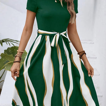 Green striped belted flare dress with short sleeves, casual summer style.