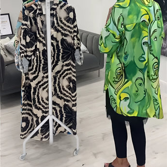 Green tropical print women's designer statement jacket featuring a chic, lightweight design with long sleeves and a stylish collar.