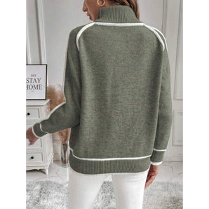 Green turtleneck women's winter sweater with striped trim featuring long sleeves and a woolen knit design.