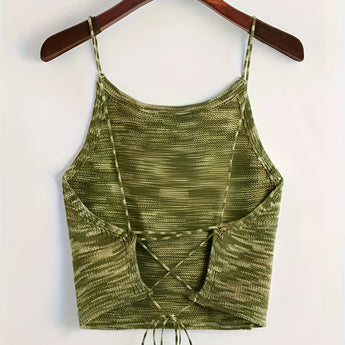 Green velvet crop top with adjustable straps, suitable for party wear; features a sleeveless design with a fitted waist.