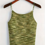 Green velvet crop top featuring adjustable straps, displayed on a clothes hanger. The top is styled for party wear and available in size 2XL.