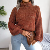 Orange women's chunky cable knit high-neck wool sweater in size large, featuring long sleeves and intricate knit detailing.