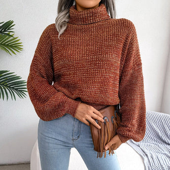 Orange women's chunky cable knit high-neck wool sweater in size large, featuring long sleeves and intricate knit detailing.