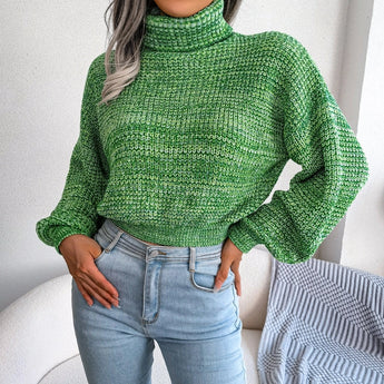 Green women's chunky cable knit high-neck wool sweater in a large size, featuring long sleeves and intricate knitting details.