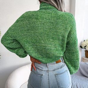 
A green women's chunky cable knit high-neck wool sweater, featuring long sleeves and a cozy texture.