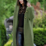 Green women's oversized hooded cardigan with a chunky knit design, featuring long sleeves and a cozy, relaxed fit.