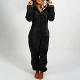 Woman wearing a black, 5XL, grey fleece hooded onesie cozy winter jumpsuit with sleeves, visible waist, and knee-length coverage.