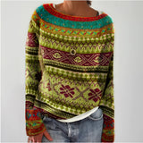 Handmade blue mohair sweater with a forest print, showcasing long sleeves and a cozy woolen texture. The knit design features artistic patterns with hints of pink and magenta, and a collar for added warmth, suitable for winter wear.