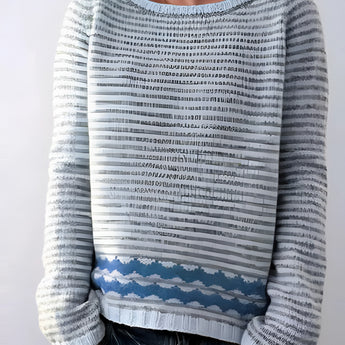 Handmade blue mohair sweater with a forest print design, featuring long sleeves and a round neckline. The cozy winter knit is displayed in a gray color variant, size 5XL. The sweater is styled on a mannequin, showcasing its soft texture and comfortable fit.