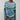 Handmade women's multicolor wool sweater in shades of blue and green, featuring a knit pattern with a collar and long sleeves, available in size 3XL.