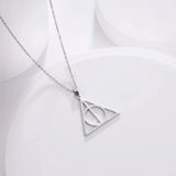 Silver Deathly Hallows pendant necklace featuring a circular charm, made of metal, with a chain length of 45-50cm.