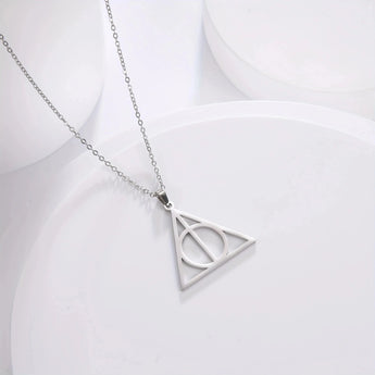Silver Deathly Hallows pendant necklace featuring a circular charm, made of metal, with a chain length of 45-50cm.