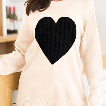 Heart Pattern Grey Oversized Sweater being worn by a woman, showcasing its cozy knit pullover design.