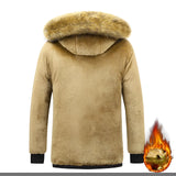 Heated men's insulated parka with a fur-lined hood, flame-resistant material, showcasing its protective shoulder and neck design, and featuring long sleeves.