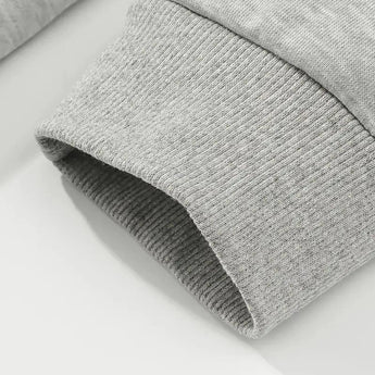 Heather grey women's lightweight casual pullover hoodie featuring long sleeves, designed for comfort and cozy fall fashion.