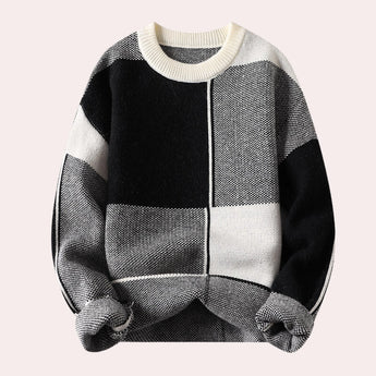 Black and white herringbone knit sweater featuring a classic collar and long sleeves, suitable for winter fashion in size XL.