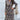 Woman wearing a marine blue, high-neck, long sleeve leopard print dress, posing with her arm slightly raised, showcasing trendy fall fashion in size XL.