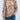 
A stylish beige high-neck paisley blouse in size 2XL, featuring a bohemian design with long sleeves and a detailed collar, perfect for an autumn wardrobe.