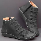 High-top black leather sneakers featuring a zipper and lace-up design, with synthetic rubber soles, size 46.