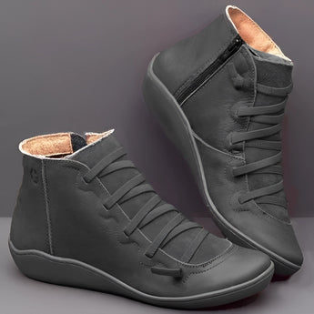 High-top black leather sneakers featuring a zipper and lace-up design, with synthetic rubber soles, size 46.