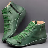 
High-top brown leather sneakers with a zipper and lace-up design, shown in a green color variant, size 46.
