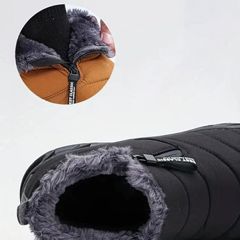 High-traction athletic sneakers with anti-slip rubber soles featuring a tread pattern similar to that of an automotive tire, designed for enhanced grip and stability. The sneakers are primarily grey in color.