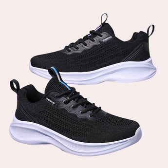 Black and white women's sneakers with a durable non-slip sole, designed for high traction and walking comfort, displayed in size 42.