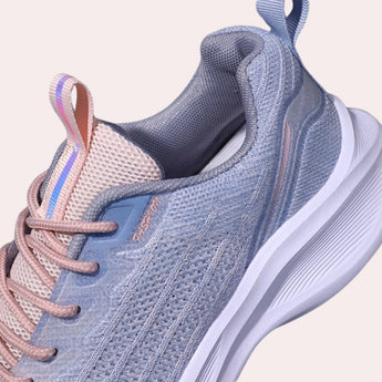 High-traction women's sneakers in electric blue and carmine colors, featuring a durable non-slip sole, suitable for outdoor activities, walking, running, and cross-training.
