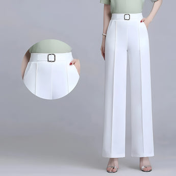 A white blazer paired with high-waist black wide-leg trousers, showcasing an elegant formal business attire.