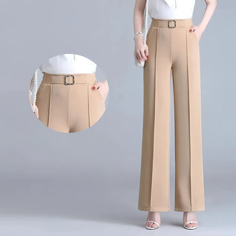 High-waist black wide-leg trousers with an elegant and formal design for business wear, shown in a beige dress shirt with visible shoulder and waist details, suitable for a sophisticated office look.