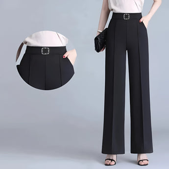 Wide-leg black trousers with a high waist, styled for formal business occasions, paired with a grey dress shirt.