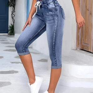 Women's lightweight high-waist denim capri jeans with drawstring, ideal for summer fashion, shown in blue.