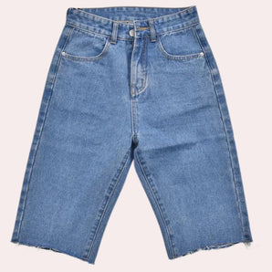High-waist light wash denim Bermuda shorts featuring a frayed hem and pockets, showcasing a stylish and casual look in a soft electric blue hue.