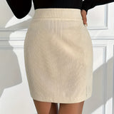 High Waist Ribbed Mini Skirt in Apricot, worn by a person with a casual chic autumn outfit, showcasing the skirt's texture and fit.