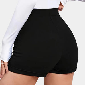 
A pair of women's plus-size high-waist seamless black spandex shorts, showcasing the waist and thigh areas.