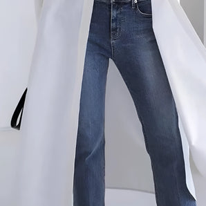 High-waist slim fit vintage wash straight leg blue jeans featuring a denim fabric with a classic pocket design, showcasing a stylish and fashionable look.