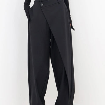 High-waisted black slim fit women's business trousers showcasing a sleek design with a fitted silhouette, emphasizing the waist and tapering down through the leg.