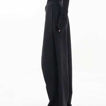 High-waisted black slim fit women's business trousers displayed on a mannequin, showcasing the tailored design suitable for formal wear.