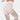 High-waisted geometric yoga pants in a breathable, stretchable fabric, showcasing a white geometric pattern; the image focuses on the human body from the waist down, highlighting leg coverage and fit around the waist, thigh, and knee.