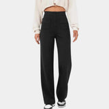 High-waisted teal wide-leg palazzo pants designed for versatile office wear, featuring a comfortable fit around the waist and a fashionable wide-leg cut that falls elegantly over the legs.
