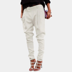 High-waisted white women's trousers in a chic ivory color, tailored for a stylish fit, shown in a size 3XL.