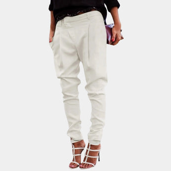 High-waisted white women's trousers in a chic ivory color, tailored for a stylish fit, shown in a size 3XL.