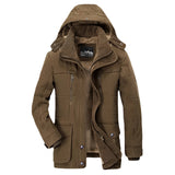 Brown hooded winter jacket in coffee color, featuring textured fabric and brown suede patches, shown in size 6XL. The jacket has long sleeves, a collar, and a mix of brown and beige tones.